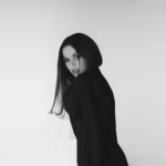 Vampire with black hair in black dress